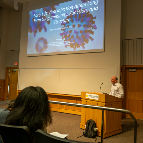 Nicholas Lukacs presents his research on early life RSV infections and lung function.